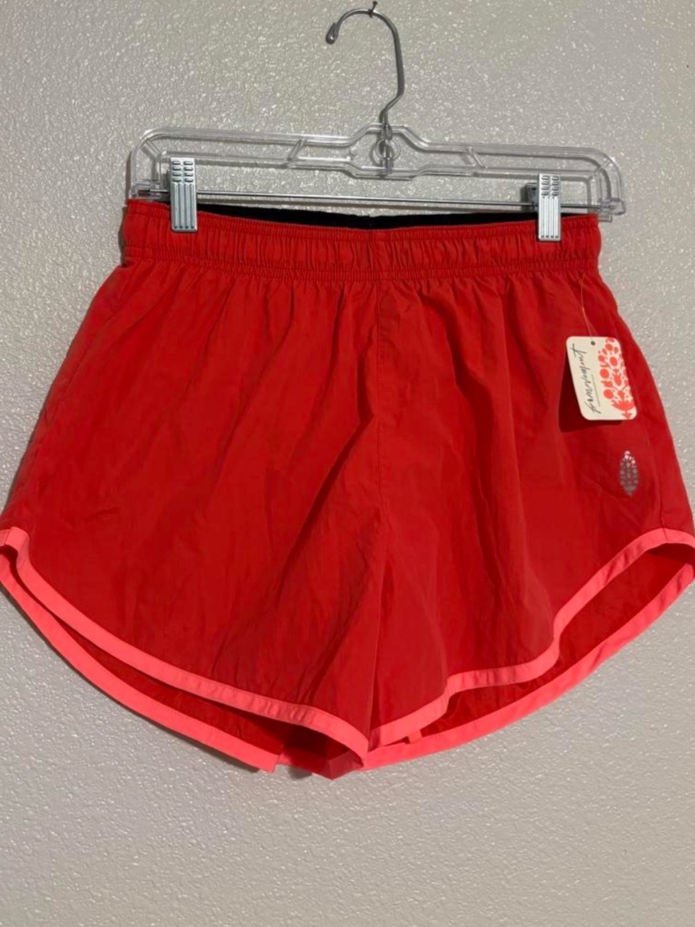 Free People Movement Now or Never run shorts red grapefruit S